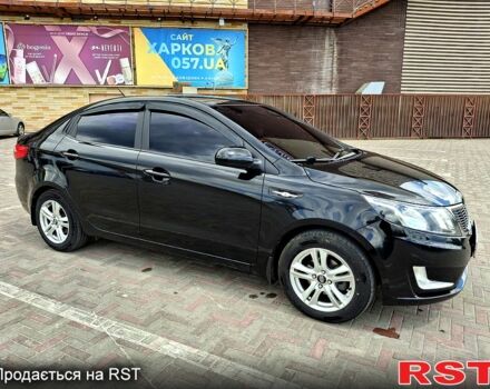 Чорний Кіа Ріо, об'ємом двигуна 14 л та пробігом 96 тис. км за 8600 $, фото 2 на Automoto.ua