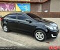 Чорний Кіа Ріо, об'ємом двигуна 14 л та пробігом 96 тис. км за 8600 $, фото 2 на Automoto.ua