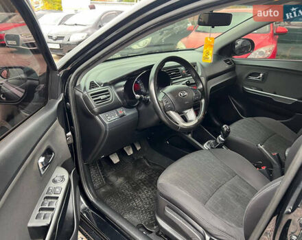 Черный Киа Рио, объемом двигателя 1.6 л и пробегом 170 тыс. км за 7999 $, фото 10 на Automoto.ua