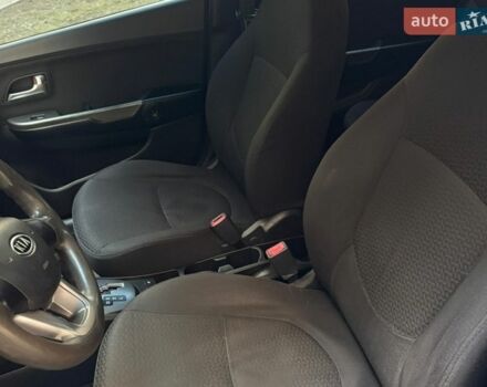 Чорний Кіа Ріо, об'ємом двигуна 1.6 л та пробігом 272 тис. км за 5950 $, фото 11 на Automoto.ua