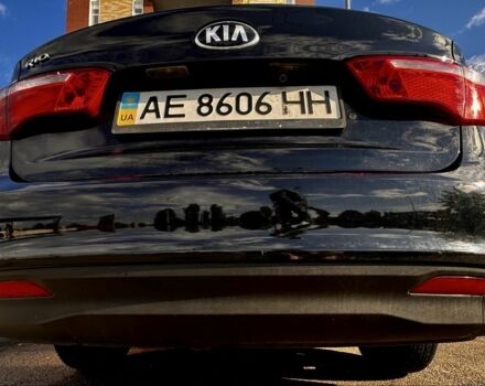 Чорний Кіа Ріо, об'ємом двигуна 1.4 л та пробігом 73 тис. км за 9000 $, фото 7 на Automoto.ua