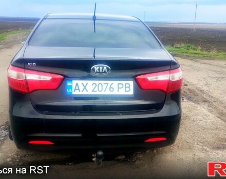 Чорний Кіа Ріо, об'ємом двигуна 1.6 л та пробігом 91 тис. км за 7800 $, фото 2 на Automoto.ua