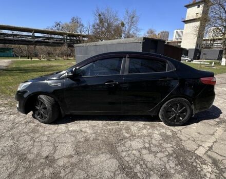 Чорний Кіа Ріо, об'ємом двигуна 1.6 л та пробігом 329 тис. км за 6000 $, фото 6 на Automoto.ua