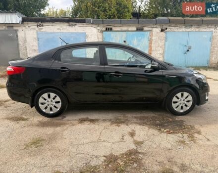 Черный Киа Рио, объемом двигателя 1.6 л и пробегом 61 тыс. км за 10300 $, фото 3 на Automoto.ua