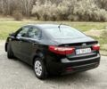 Чорний Кіа Ріо, об'ємом двигуна 1.4 л та пробігом 45 тис. км за 9800 $, фото 6 на Automoto.ua