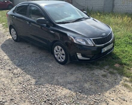 Черный Киа Рио, объемом двигателя 1.4 л и пробегом 212 тыс. км за 7700 $, фото 1 на Automoto.ua
