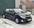 Черный Киа Рио, объемом двигателя 1.4 л и пробегом 124 тыс. км за 9350 $, фото 1 на Automoto.ua