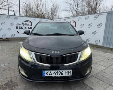 Чорний Кіа Ріо, об'ємом двигуна 1.4 л та пробігом 214 тис. км за 7700 $, фото 4 на Automoto.ua
