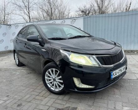 Чорний Кіа Ріо, об'ємом двигуна 1.4 л та пробігом 214 тис. км за 7700 $, фото 1 на Automoto.ua