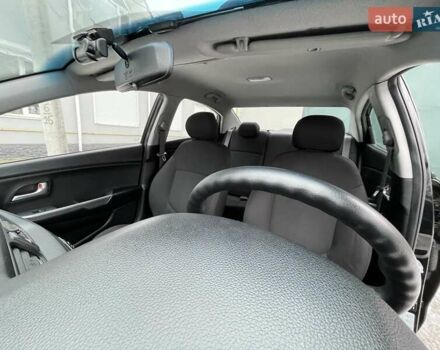 Черный Киа Рио, объемом двигателя 1.4 л и пробегом 124 тыс. км за 9350 $, фото 68 на Automoto.ua