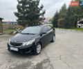 Черный Киа Рио, объемом двигателя 1.4 л и пробегом 136 тыс. км за 7700 $, фото 2 на Automoto.ua