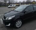 Черный Киа Рио, объемом двигателя 1.6 л и пробегом 150 тыс. км за 9000 $, фото 1 на Automoto.ua