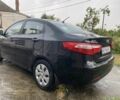 Чорний Кіа Ріо, об'ємом двигуна 1.4 л та пробігом 88 тис. км за 8300 $, фото 7 на Automoto.ua