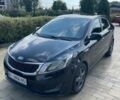 Черный Киа Рио, объемом двигателя 1.4 л и пробегом 247 тыс. км за 7800 $, фото 1 на Automoto.ua