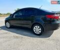Чорний Кіа Ріо, об'ємом двигуна 1.6 л та пробігом 142 тис. км за 6800 $, фото 2 на Automoto.ua