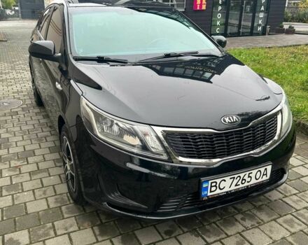 Черный Киа Рио, объемом двигателя 1.4 л и пробегом 141 тыс. км за 7200 $, фото 1 на Automoto.ua