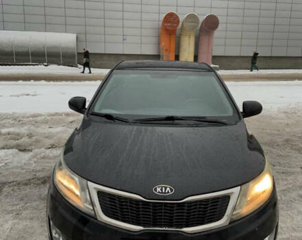 Черный Киа Рио, объемом двигателя 1.6 л и пробегом 270 тыс. км за 5850 $, фото 1 на Automoto.ua