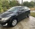 Чорний Кіа Ріо, об'ємом двигуна 1.4 л та пробігом 88 тис. км за 8300 $, фото 1 на Automoto.ua
