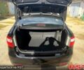 Чорний Кіа Ріо, об'ємом двигуна 1.6 л та пробігом 61 тис. км за 10000 $, фото 12 на Automoto.ua