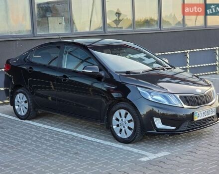 Черный Киа Рио, объемом двигателя 1.6 л и пробегом 192 тыс. км за 6999 $, фото 1 на Automoto.ua