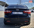 Черный Киа Рио, объемом двигателя 1.4 л и пробегом 234 тыс. км за 6200 $, фото 5 на Automoto.ua