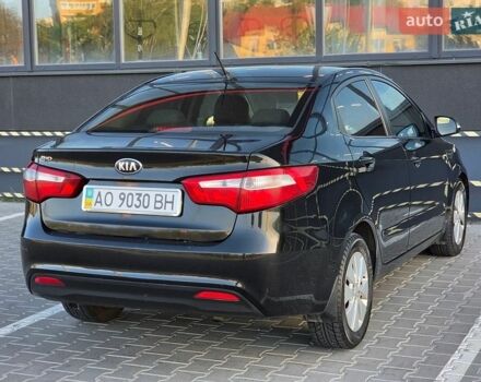 Черный Киа Рио, объемом двигателя 1.6 л и пробегом 192 тыс. км за 6999 $, фото 9 на Automoto.ua