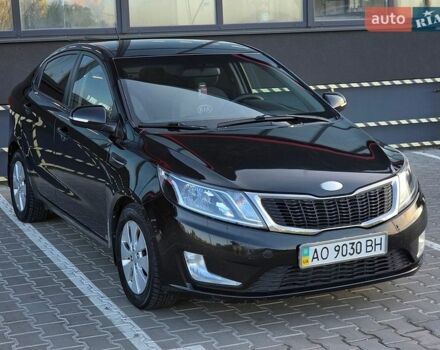 Черный Киа Рио, объемом двигателя 1.6 л и пробегом 192 тыс. км за 6999 $, фото 2 на Automoto.ua