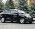 Чорний Кіа Ріо, об'ємом двигуна 1.4 л та пробігом 84 тис. км за 7800 $, фото 1 на Automoto.ua