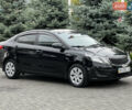 Чорний Кіа Ріо, об'ємом двигуна 1.4 л та пробігом 84 тис. км за 7800 $, фото 8 на Automoto.ua