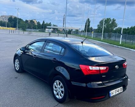 Черный Киа Рио, объемом двигателя 1.4 л и пробегом 240 тыс. км за 5900 $, фото 2 на Automoto.ua