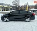 Черный Киа Рио, объемом двигателя 1.4 л и пробегом 66 тыс. км за 11950 $, фото 5 на Automoto.ua