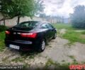 Чорний Кіа Ріо, об'ємом двигуна 1.4 л та пробігом 179 тис. км за 6100 $, фото 2 на Automoto.ua