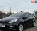 Черный Киа Рио, объемом двигателя 1.25 л и пробегом 100 тыс. км за 8500 $, фото 1 на Automoto.ua