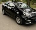 Черный Киа Рио, объемом двигателя 1.4 л и пробегом 180 тыс. км за 6900 $, фото 1 на Automoto.ua