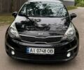 Чорний Кіа Ріо, об'ємом двигуна 1.4 л та пробігом 180 тис. км за 6900 $, фото 1 на Automoto.ua
