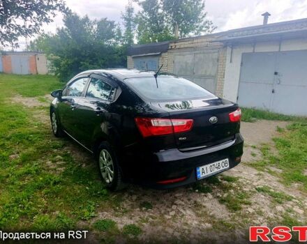 Чорний Кіа Ріо, об'ємом двигуна 1.4 л та пробігом 179 тис. км за 6100 $, фото 5 на Automoto.ua
