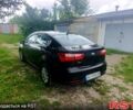 Чорний Кіа Ріо, об'ємом двигуна 1.4 л та пробігом 179 тис. км за 6100 $, фото 5 на Automoto.ua