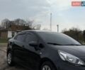 Черный Киа Рио, объемом двигателя 1.25 л и пробегом 100 тыс. км за 8300 $, фото 1 на Automoto.ua