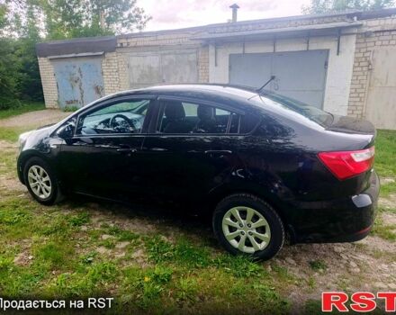 Чорний Кіа Ріо, об'ємом двигуна 1.4 л та пробігом 179 тис. км за 6100 $, фото 4 на Automoto.ua