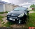 Чорний Кіа Ріо, об'ємом двигуна 1.4 л та пробігом 179 тис. км за 6100 $, фото 1 на Automoto.ua