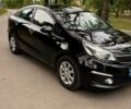 Чорний Кіа Ріо, об'ємом двигуна 1.4 л та пробігом 180 тис. км за 6900 $, фото 2 на Automoto.ua