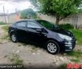 Чорний Кіа Ріо, об'ємом двигуна 1.4 л та пробігом 179 тис. км за 6100 $, фото 1 на Automoto.ua