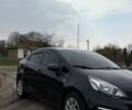 Чорний Кіа Ріо, об'ємом двигуна 1.25 л та пробігом 100 тис. км за 7500 $, фото 1 на Automoto.ua