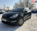 Черный Киа Рио, объемом двигателя 1.59 л и пробегом 180 тыс. км за 7999 $, фото 1 на Automoto.ua