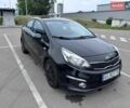 Чорний Кіа Ріо, об'ємом двигуна 1.4 л та пробігом 168 тис. км за 10000 $, фото 3 на Automoto.ua