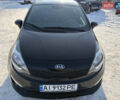 Черный Киа Рио, объемом двигателя 1.59 л и пробегом 180 тыс. км за 7999 $, фото 1 на Automoto.ua
