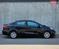 Черный Киа Рио, объемом двигателя 1.4 л и пробегом 91 тыс. км за 11500 $, фото 5 на Automoto.ua