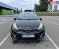 Чорний Кіа Ріо, об'ємом двигуна 1.4 л та пробігом 168 тис. км за 10000 $, фото 1 на Automoto.ua