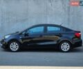 Черный Киа Рио, объемом двигателя 1.4 л и пробегом 91 тыс. км за 11500 $, фото 1 на Automoto.ua