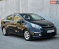 Черный Киа Рио, объемом двигателя 1.4 л и пробегом 91 тыс. км за 11500 $, фото 6 на Automoto.ua